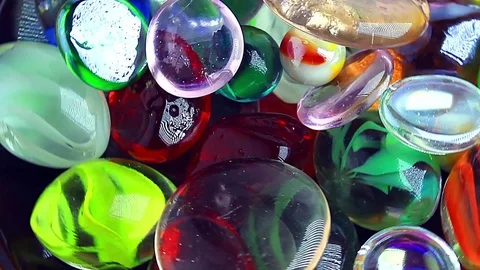 Multicolored glass on a plate Stock Footage 73829066