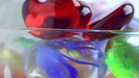Multicolored glass on a plate Stock Footage 74563976