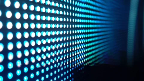 Multicolored glowing RGB dots diode blinking disco lights. LED screen backgro 스톡 동영상 128959494