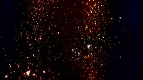 Multicolored, glowing, small circles in the dark Stock Photos