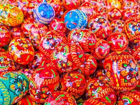 Multicolored handmade Easter eggs. Ukrainian pysanka decorated Easter Background Stock Photos