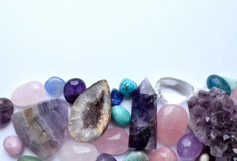 Multicolored healing chakra crystals.  Copy space. Real semi-precious stone.. Stock Photos