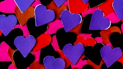 Multicolored heart on black background for valentine's day Stock Photos