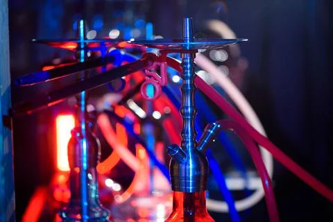 Multicolored hookah in the restaurant. Hookah elements on the background of the Stock Photos
