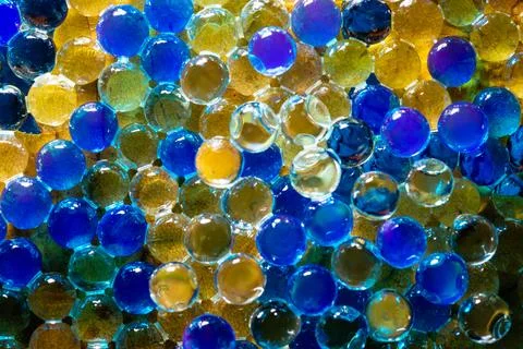 Multicolored hydrogel beads abstract macro texture Stock Photos