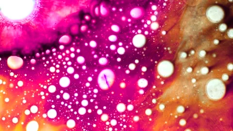 Multicolored ink drops on a white background. Liquid background. Video stock 150680370