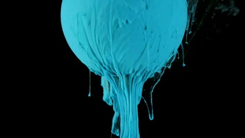 Multicolored ink paint slowly flows from the ball Stock Footage 104129445