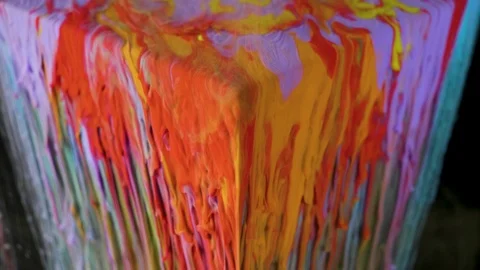 Multicolored ink paint slowly flows from the cube underwater Stock Footage 104144505