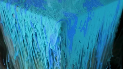 Multicolored ink paint slowly flows from the cube underwater Stock-Footage 104144583