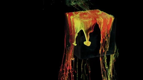 Multicolored ink paint slowly flows from the cube underwater Stock Footage 104170688