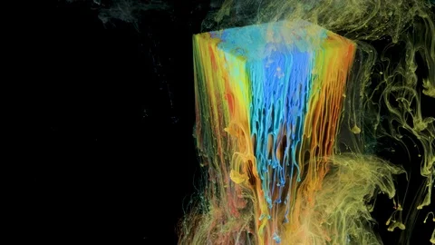 Multicolored ink paint slowly flows from the cube underwater Stock Footage 104170836