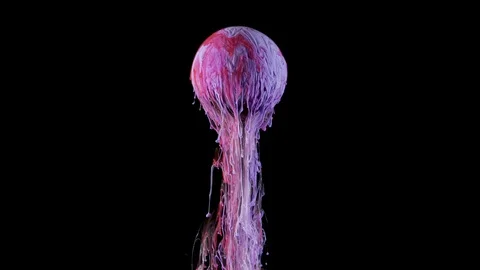 Multicolored ink paint slowly flows from the ball Stock Footage 104173149