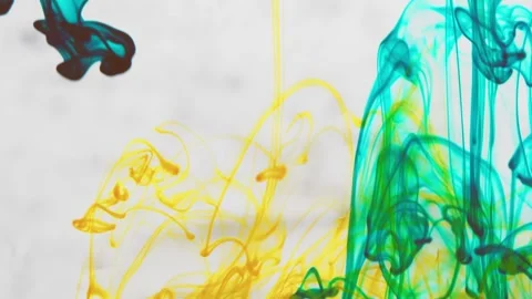 Multicolored inks spreading in water, forming whimsical patterns Video stock 246847125