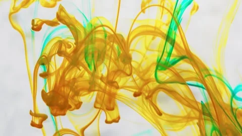 Multicolored inks spreading in water, forming whimsical patterns Video stock 246847223