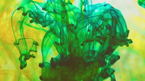 Multicolored inks spreading in water, forming whimsical patterns Video stock 246847305