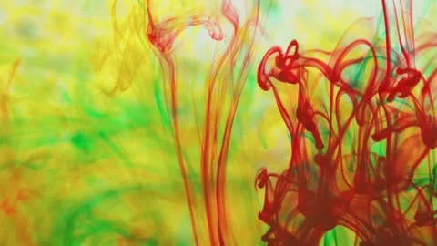Multicolored inks spreading in water, forming whimsical patterns Video stock 246847666