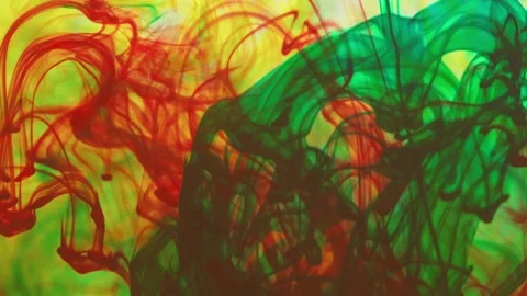Multicolored inks spreading in water, forming whimsical patterns Video stock 246847894