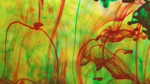 Multicolored inks spreading in water, forming whimsical patterns Video stock 246848088