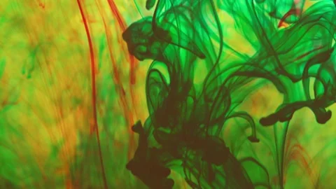 Multicolored inks spreading in water, forming whimsical patterns Video stock 246848164