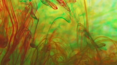 Multicolored inks spreading in water, forming whimsical patterns Video stock 246848298