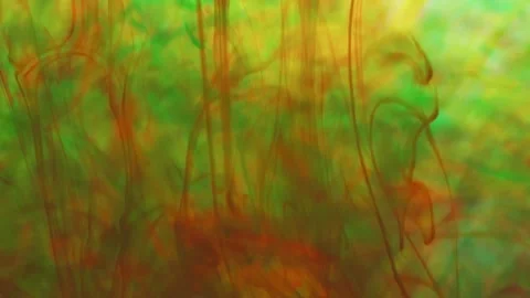 Multicolored inks spreading in water, forming whimsical patterns Video stock 246848355