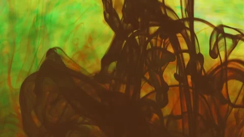 Multicolored inks spreading in water, forming whimsical patterns Video stock 246848482