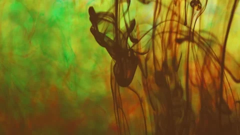 Multicolored inks spreading in water, forming whimsical patterns Video stock 246848518