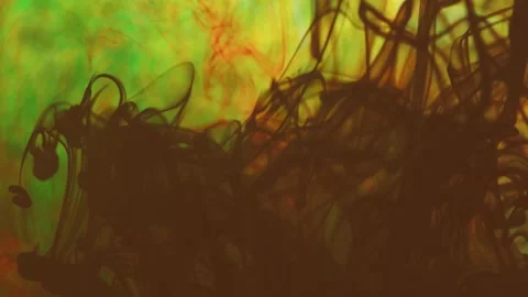 Multicolored inks spreading in water, forming whimsical patterns Video stock 246848734
