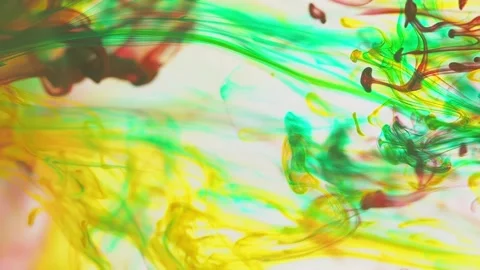 Multicolored inks spreading in water, forming whimsical patterns and iridescent Video stock 247332940