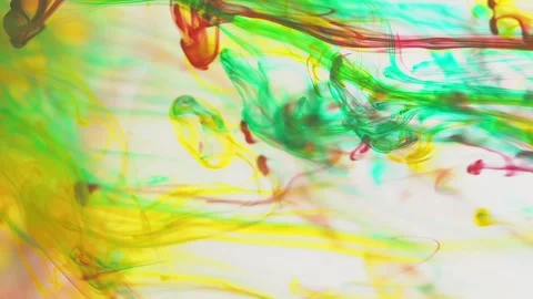 Multicolored inks spreading in water, forming whimsical patterns and iridescent Video stock 247332989