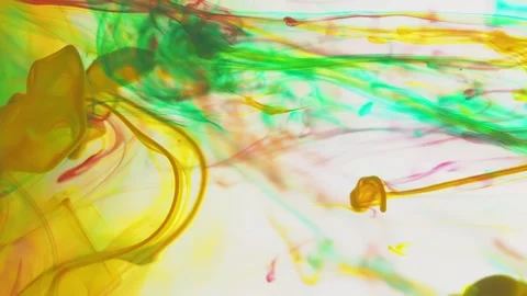 Multicolored inks spreading in water, forming whimsical patterns and iridescent Video stock 247333047
