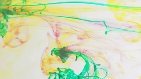 Multicolored inks spreading in water, forming whimsical patterns and iridescent Video stock 247358316
