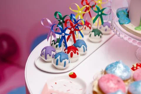 Multicolored key pops on the table Stock Photos