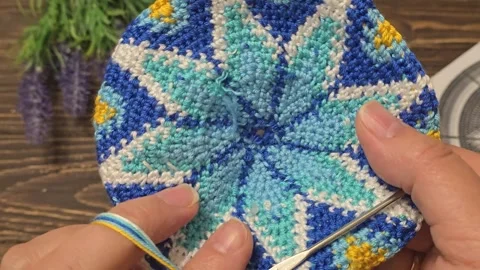 Multicolored knitted fabric, handmade. Knitting and crochet lessons. Fashion Stock Footage 340607223