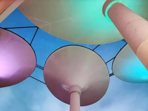 Multicolored lamp lighting in the shape of round plates Fotos Stock