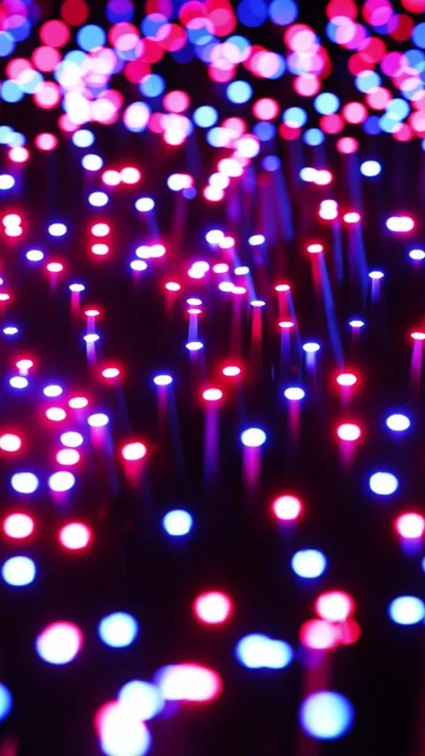 Multicolored LEDs moving in waves. Vertical looped video Stock Footage 229460005