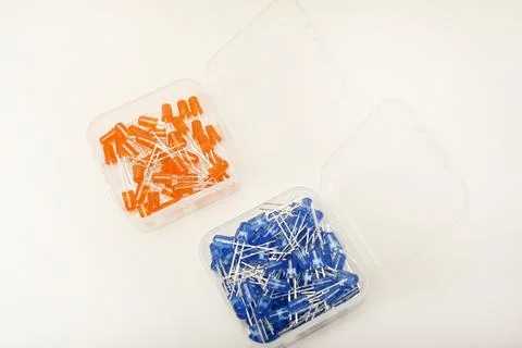 Multicolored LEDs in a plastic box. Semiconductor diodes. Electronic compon.. Stock Photos