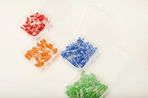 Multicolored LEDs in a plastic box. Semiconductor diodes. Electronic compon.. Stock Photos