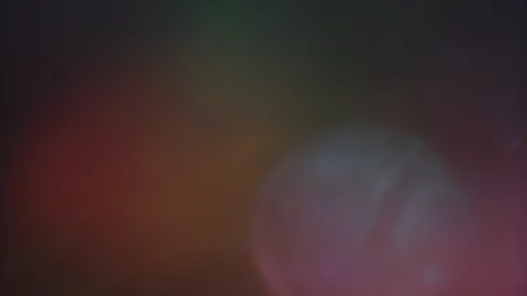 Multicolored light beams breaks through glass surface. Dreamy shimmering Stock Footage 120483628