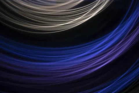 Multicolored light on a black background Stock Photos