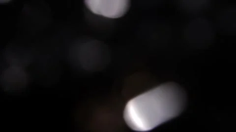 Multicolored light bokeh background video facing right Stockbeeldmateriaal 318364114