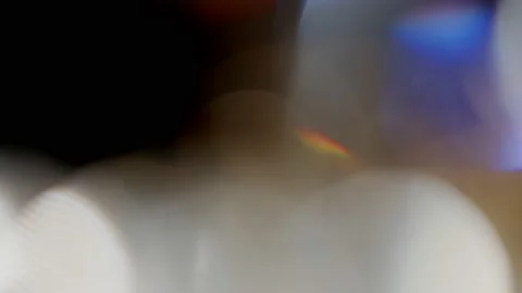 Multicolored light leaks 4k footage on b... | Stock Video | Pond5