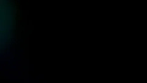 Multicolored light leaks on black background Stock-Footage 127328537