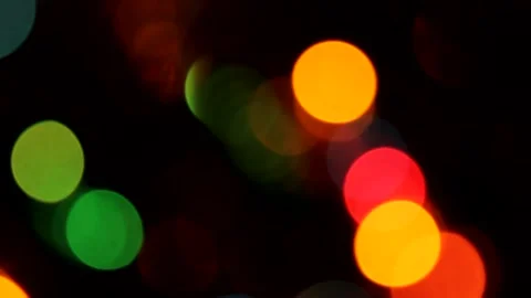 Multicolored light leaks on a black background with bokeh effect Stock Footage 165286605