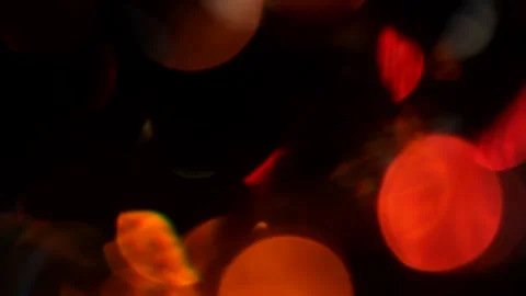 Multicolored light leaks on a black background with bokeh effect Stock Footage 165767656