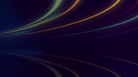 Multicolored light streaks curve gracefully against a dark background. Stock Footage 286407359
