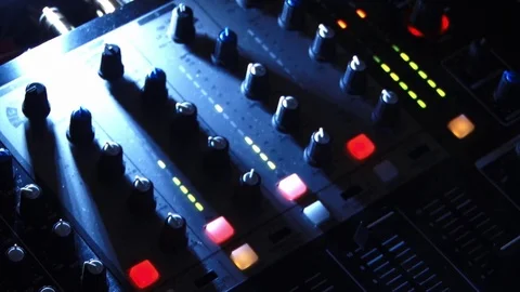 Multicolored lights and light-lit buttons of an audio mixer in the ballroom Stock Footage 80262945