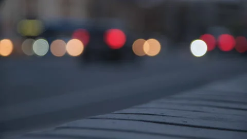 Multicolored lights of the evening city. Abstract shot of evening city traffic Stock Footage 166380160