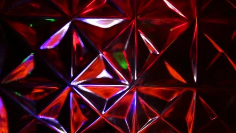 Multicolored lights flicker on the background of the triangles Stock Footage 143848813
