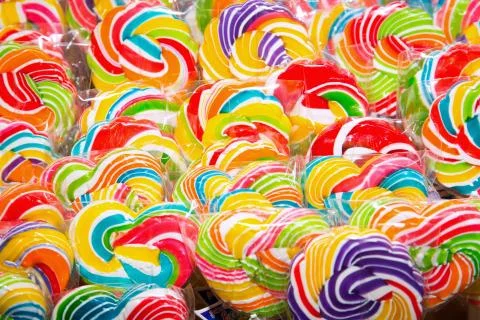 Multicolored lollipops, candy background Stock Photos